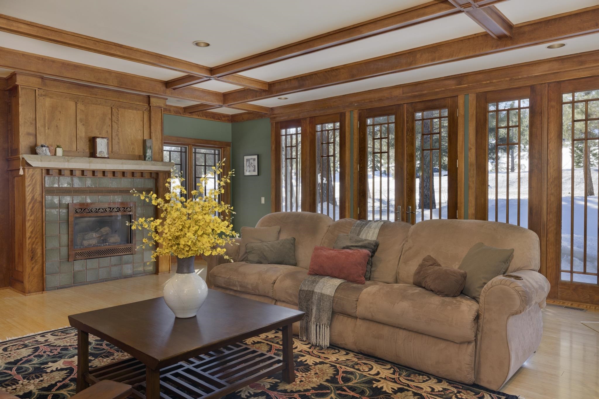 56 Wagon Road Mammoth Lakes, CA 93546 - Photo 43 of 56 Living room with coffered ceiling, a fireplace, beam ceiling, and light wood-style floors