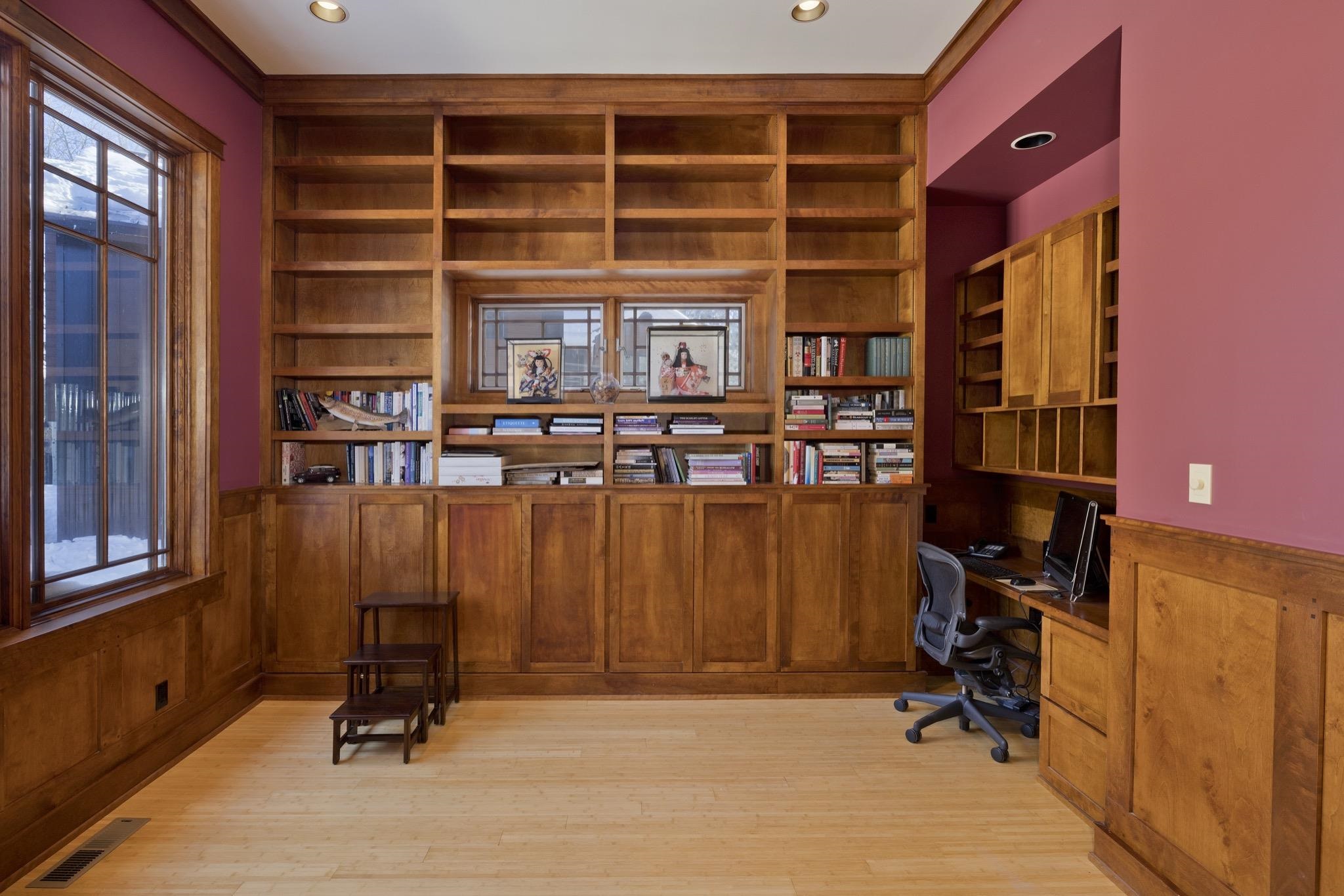 56 Wagon Road Mammoth Lakes, CA 93546 - Photo 6 of 56 Office with a wainscoted wall, built in features, built in study area, light wood-style flooring, and wooden walls