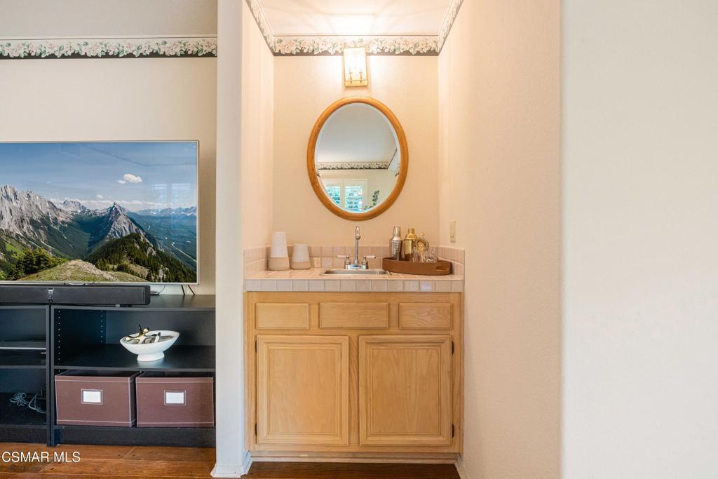 368 Pellburne Court Simi Valley, CA 93065 - Photo 20 of 55 a bathroom with a sink and a mirror