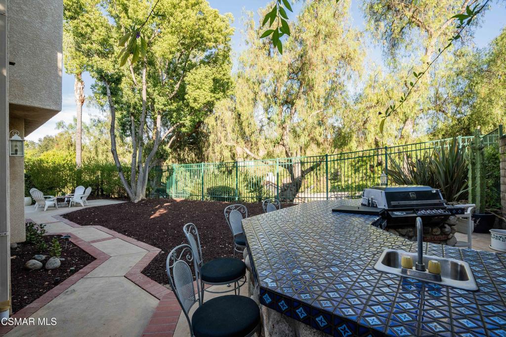 368 Pellburne Court Simi Valley, CA 93065 - Photo 52 of 55 a view of backyard with seating area and trees