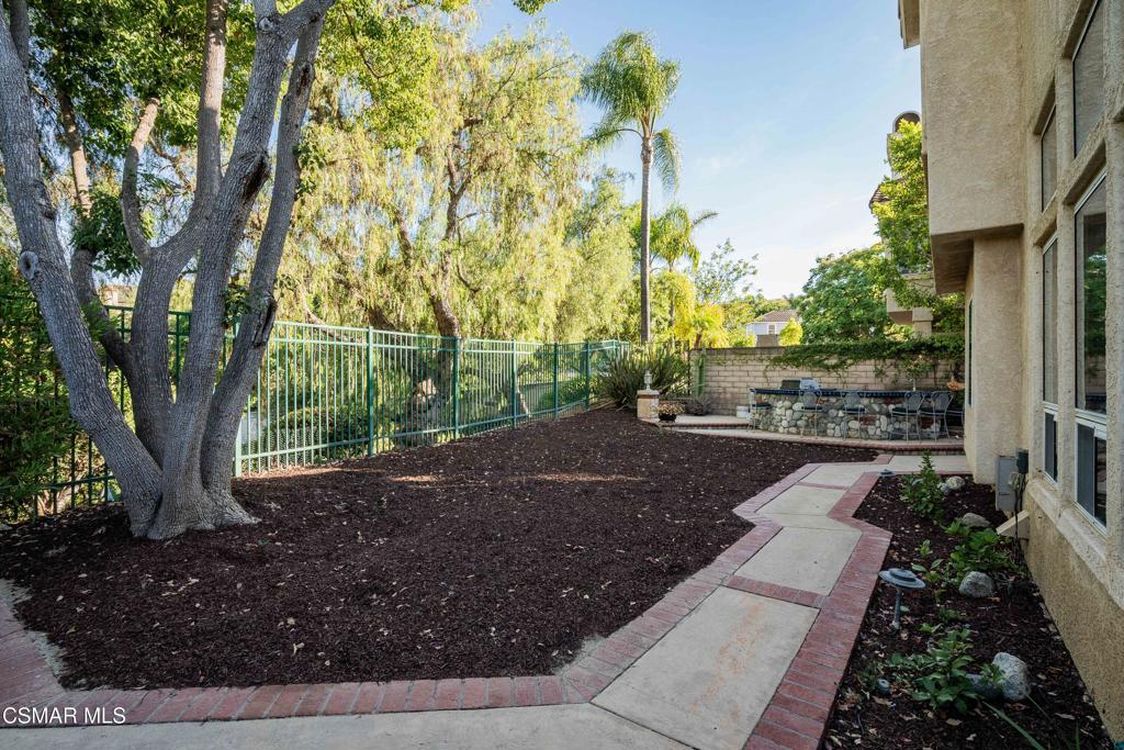 368 Pellburne Court Simi Valley, CA 93065 - Photo 53 of 55 a view of a yard with plants and trees
