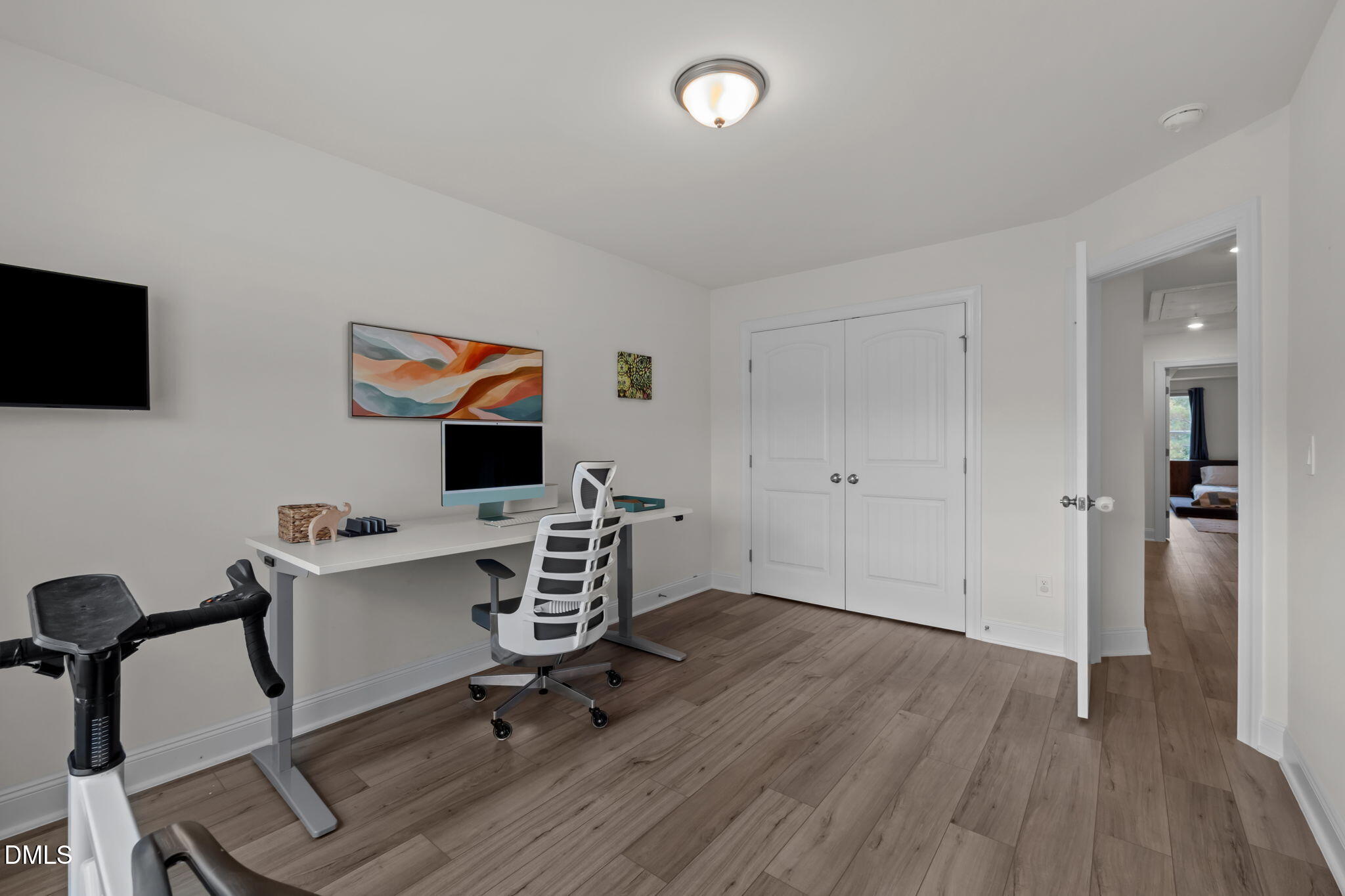 1031 Culloden Circle Durham, NC 27713 - Photo 22 of 50 a view of a workspace with furniture and wooden floor