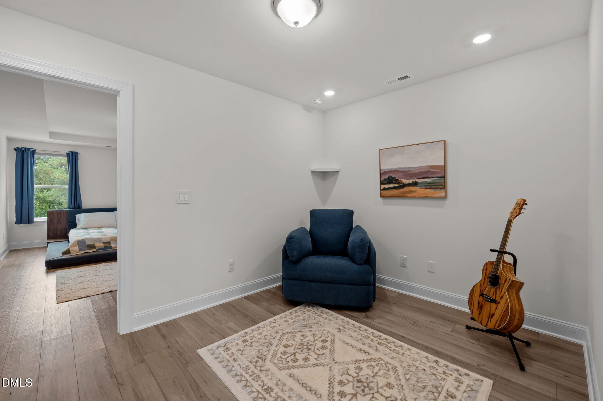1031 Culloden Circle Durham, NC 27713 - Photo 27 of 50 a living room with furniture and a window