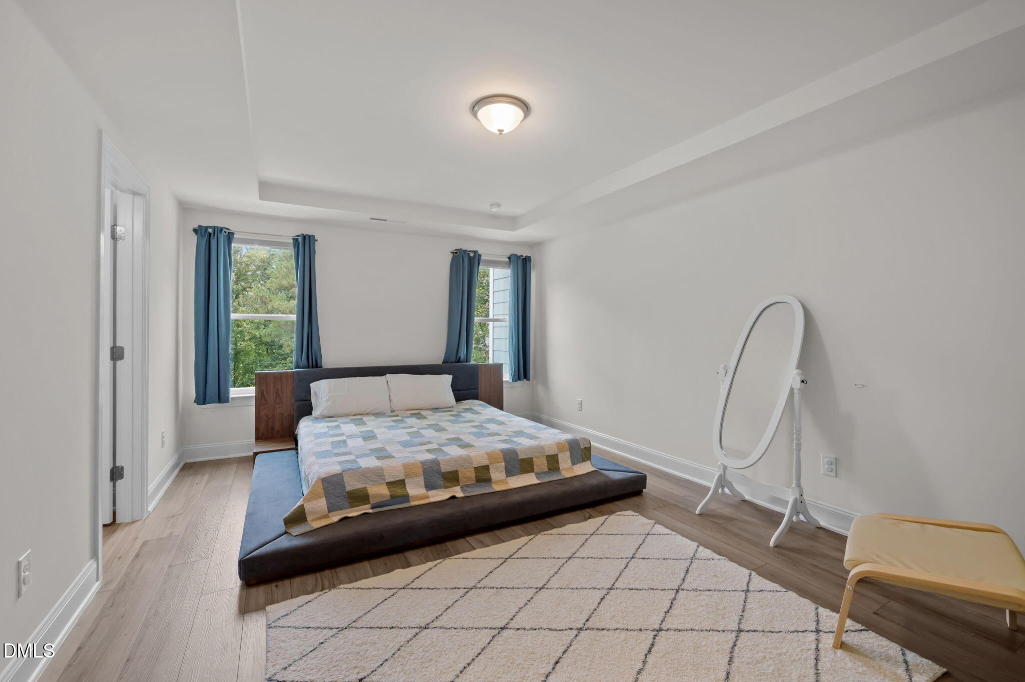 1031 Culloden Circle Durham, NC 27713 - Photo 29 of 50 a bedroom with a bed chair and window