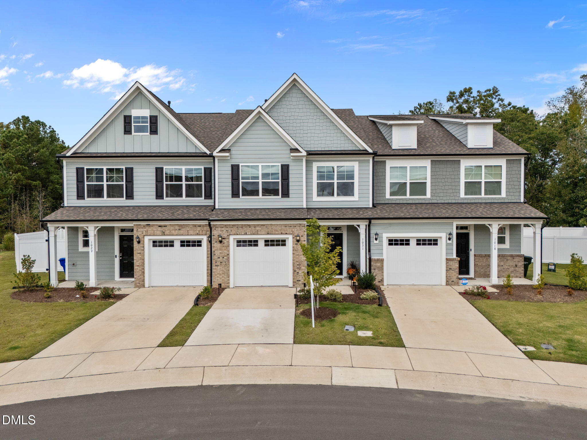 1031 Culloden Circle Durham, NC 27713 - Photo 2 of 50 a front view of residential houses with yard