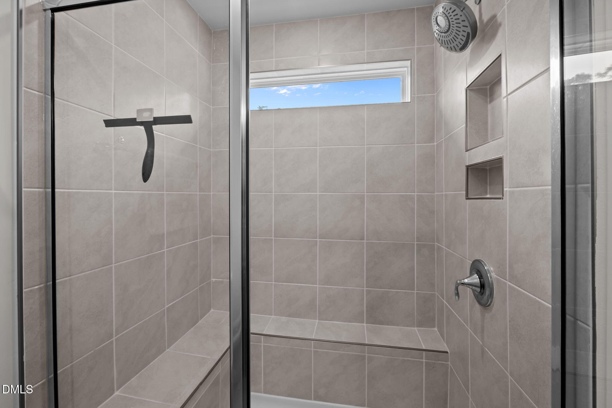 1031 Culloden Circle Durham, NC 27713 - Photo 32 of 50 a bathroom with a shower
