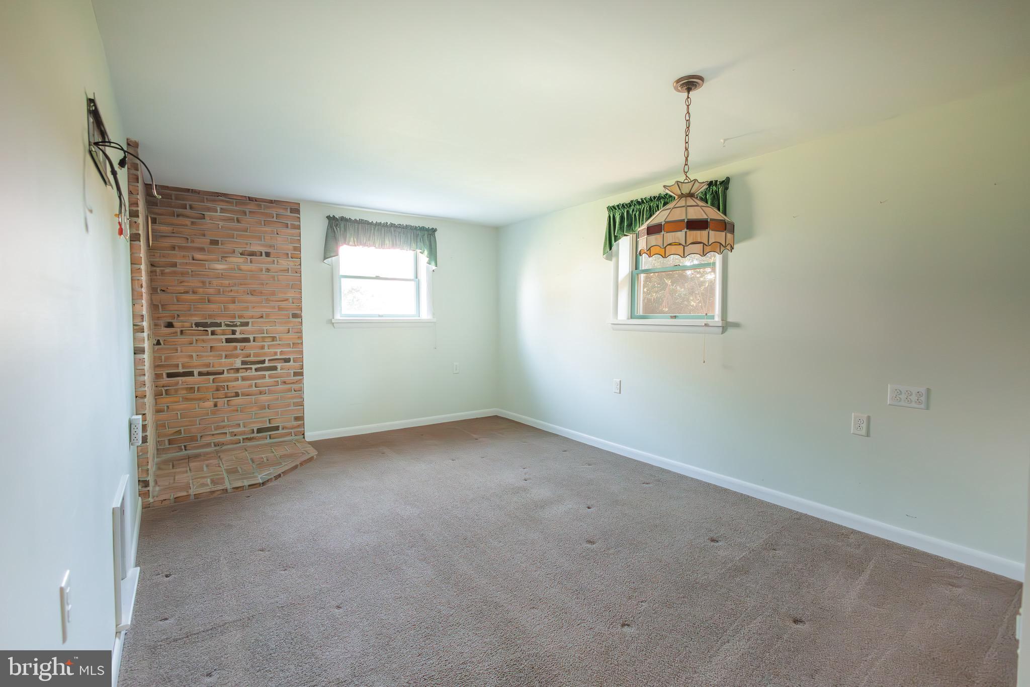 518 West Trout Run Road Ephrata, PA 17522 - Photo 33 of 36 Family room has space for wood stove