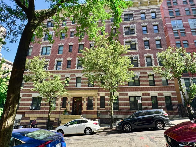 a view of a cars parked in front of a building
