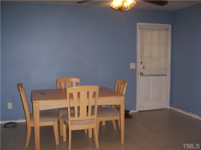 2504 Baney Court Raleigh, NC 27610 - Photo 3 of 9 Kitchen area large enough for a full size dining set. Kitchen