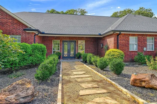 a front view of a house having yard