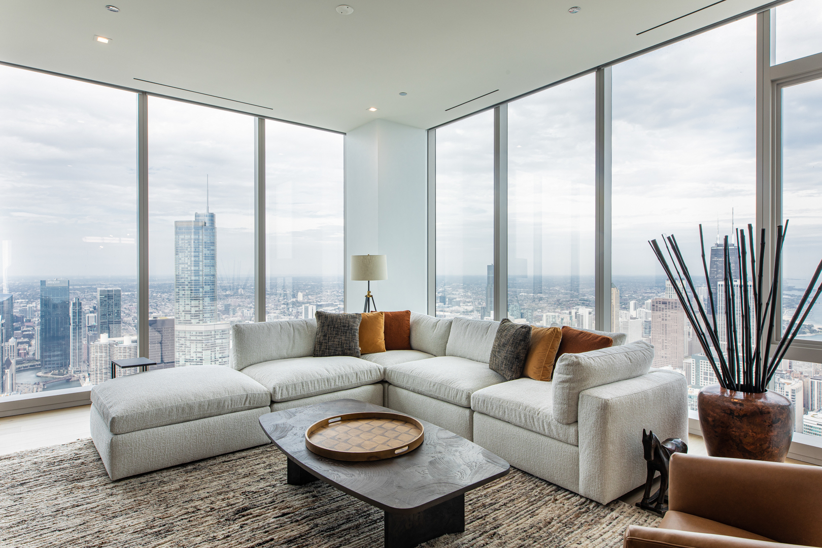 363 East Wacker Drive, Unit 8601 Chicago, IL 60601 - Photo 9 of 22 a living room with furniture and a large window