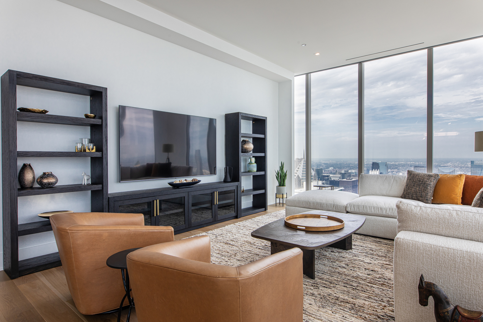 363 East Wacker Drive, Unit 8601 Chicago, IL 60601 - Photo 10 of 22 a living room with furniture a rug and a large window