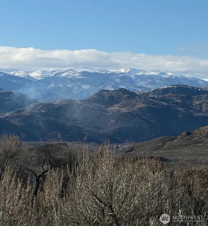 a view of mountain with lake