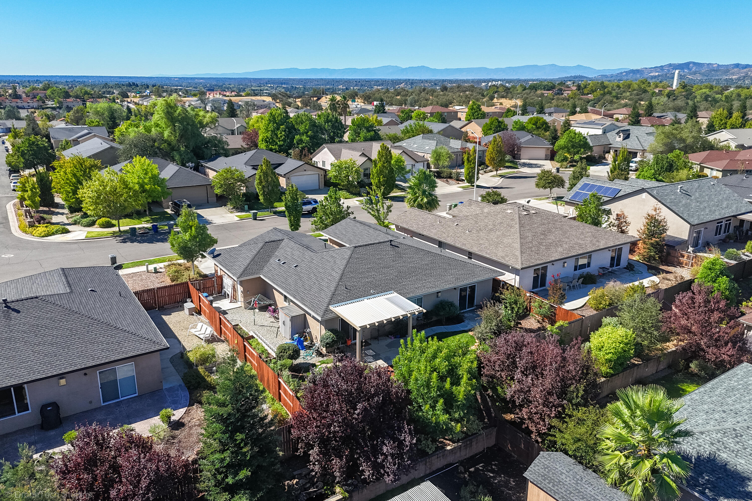 580 Grants Pass Place Redding, CA 96003 - Photo 21 of 31 Drone Backyard Side View-14