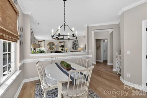 a view of a dining room and a chandelier