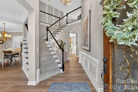a view of entryway with furniture and a potted plant