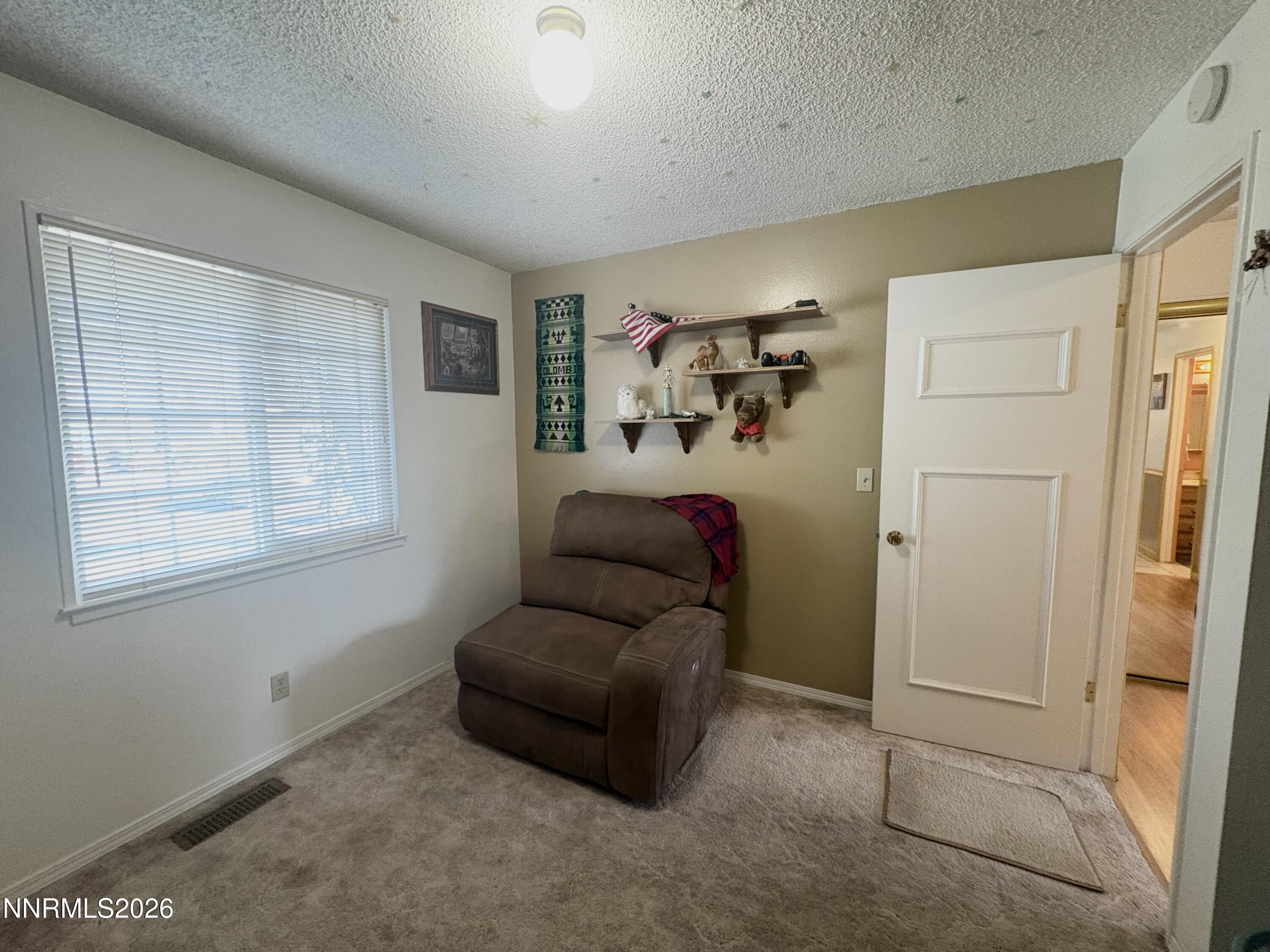 4330 Valdez Way Reno, NV 89502 - Photo 20 of 35 a hallway with closet and large windows