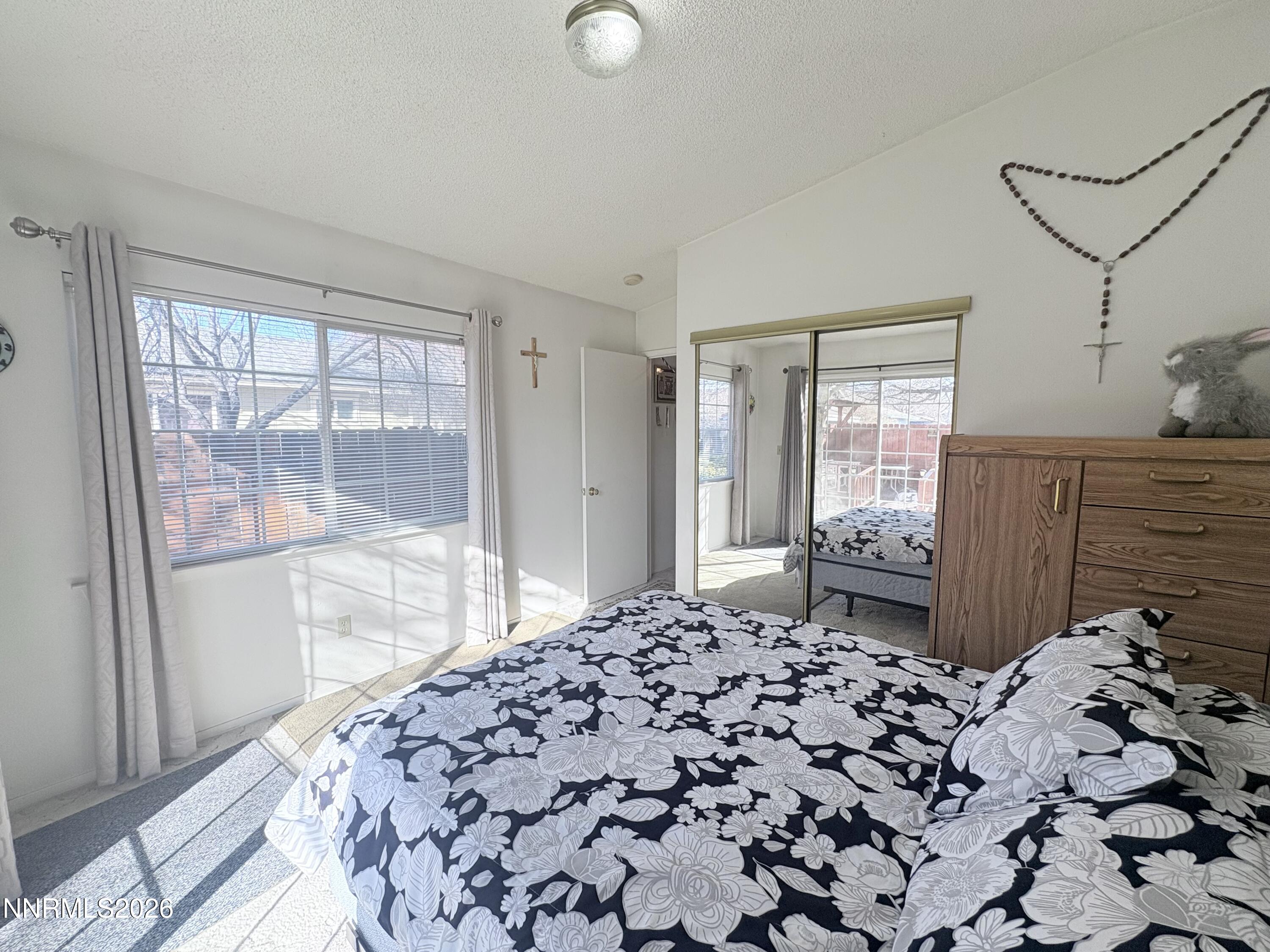 4330 Valdez Way Reno, NV 89502 - Photo 26 of 35 a bedroom with a bed and a window