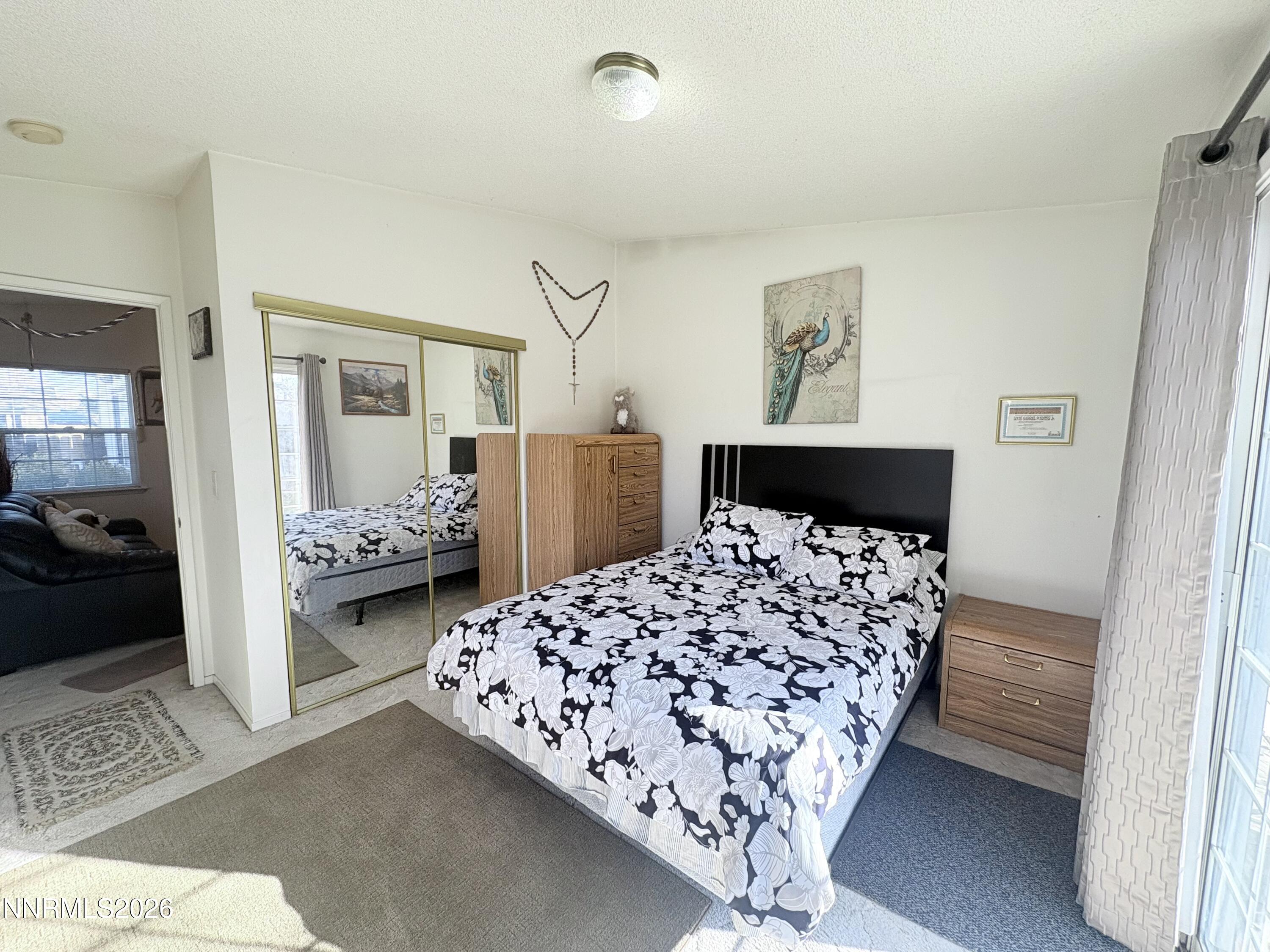 4330 Valdez Way Reno, NV 89502 - Photo 27 of 35 a bedroom with bed and window