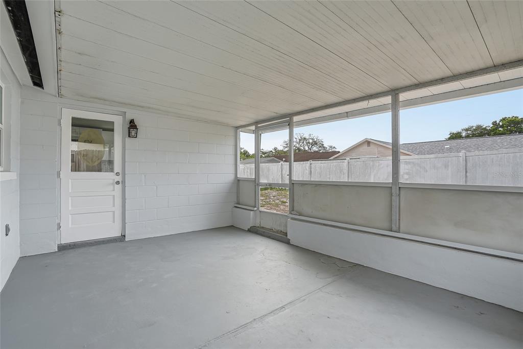 6302 Diamond Drive New Port Richey, FL 34653 - Photo 31 of 43 a view of an empty room with a window