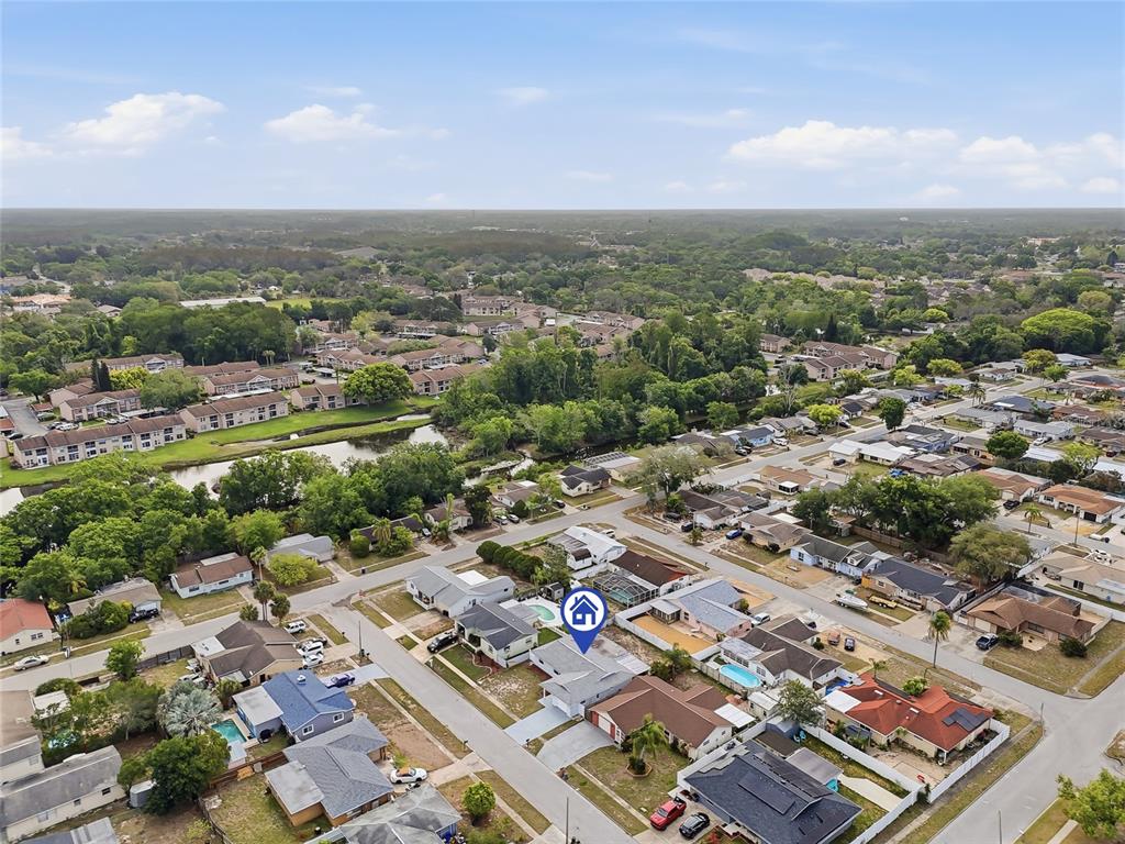 6302 Diamond Drive New Port Richey, FL 34653 - Photo 40 of 43 an aerial view of a city with lots of residential buildings