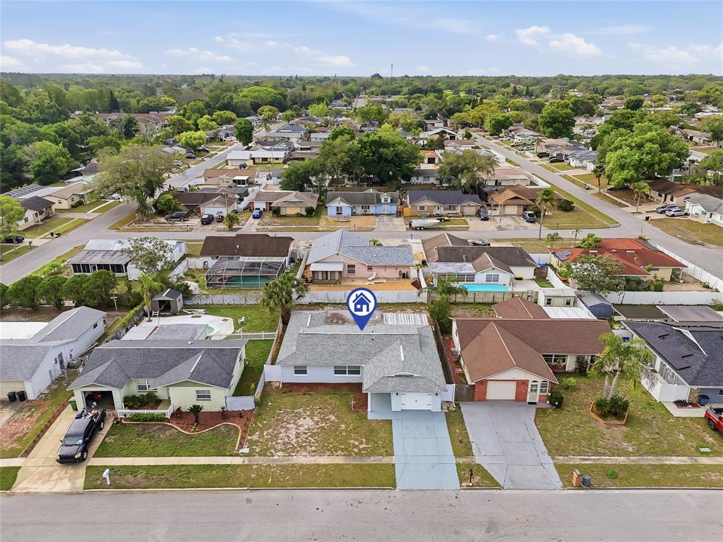 6302 Diamond Drive New Port Richey, FL 34653 - Photo 42 of 43 an aerial view of residential houses with outdoor space