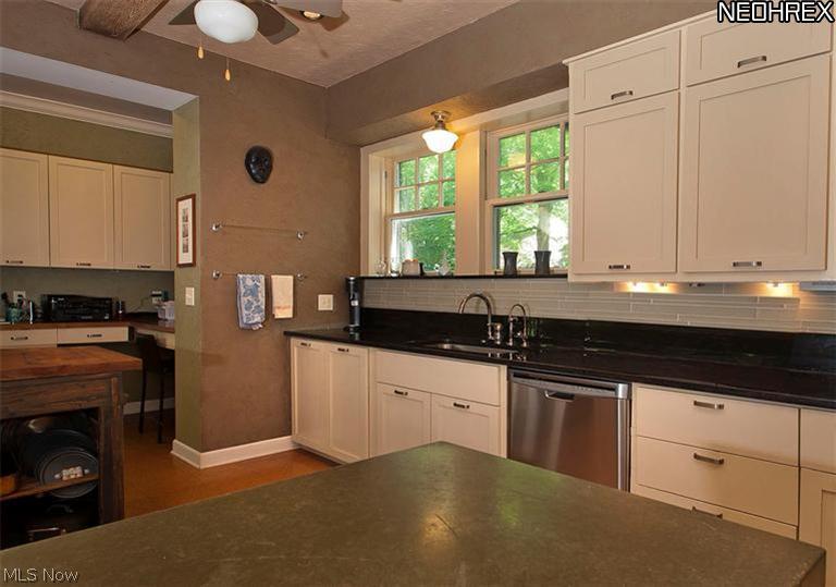 2733 Endicott Road Cleveland, OH 44120 - Photo 9 of 25 Glass tile backsplash and undercounter lighting.