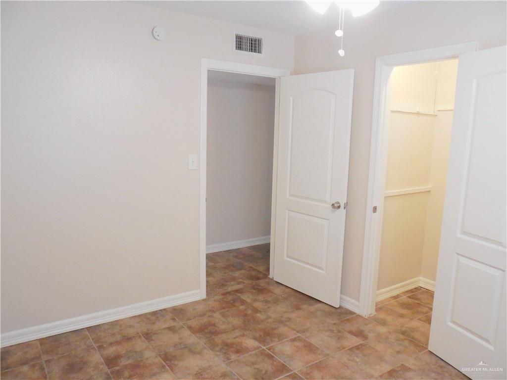 5212-5213 North Taylor Road Mission, TX 78573 - Photo 17 of 20 an empty room with windows