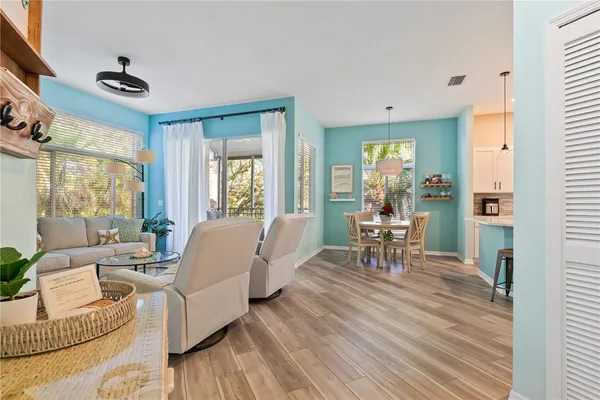a living room with furniture and a table