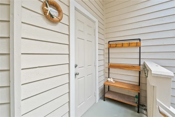 a dining room with furniture window and outside view