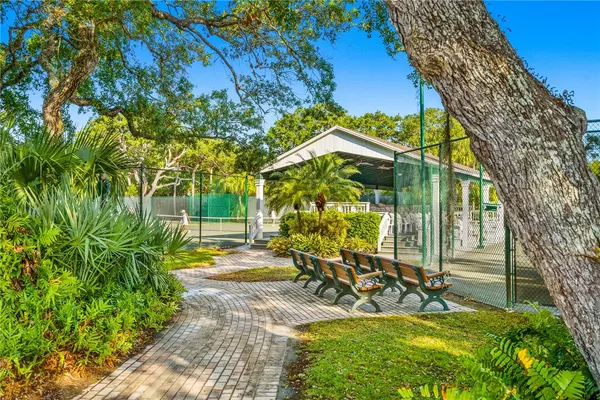 a view of a swimming pool with a patio