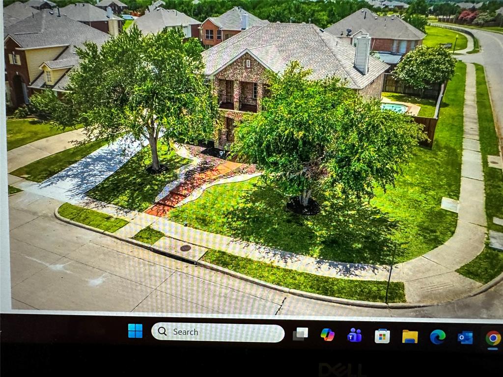 1441 Dimmit Drive Carrollton, TX 75010 - Photo 2 of 10 a view of a yard with an outdoor space
