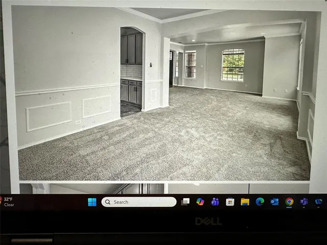 a view of swimming pool with outdoor seating