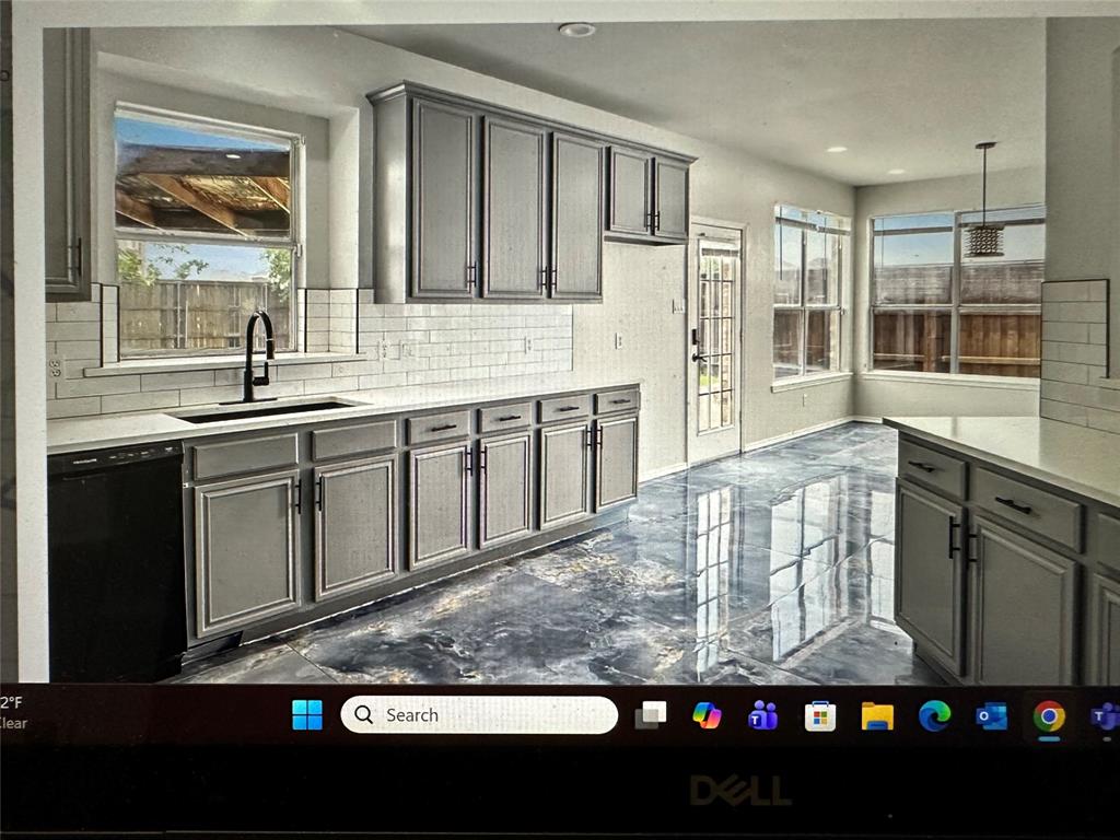 1441 Dimmit Drive Carrollton, TX 75010 - Photo 10 of 10 a view of a bathroom with sink and mirror