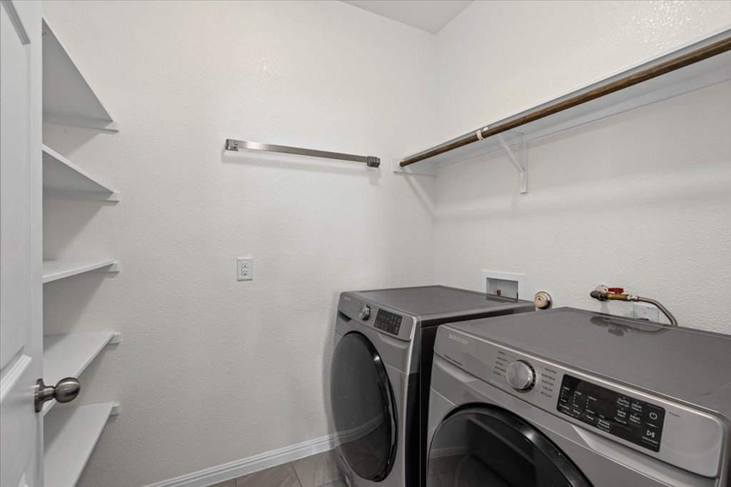 1012 Goldilocks Lane Manchaca, TX 78652 - Photo 11 of 38 Laundry room located downstairs.