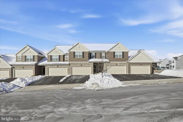 a front view of a house with a porch
