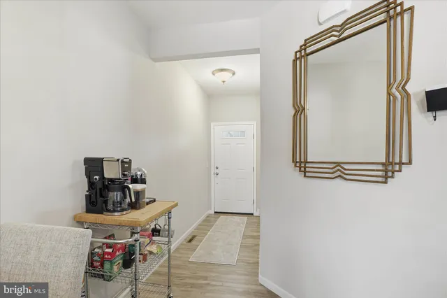 a view of a hallway with workspace