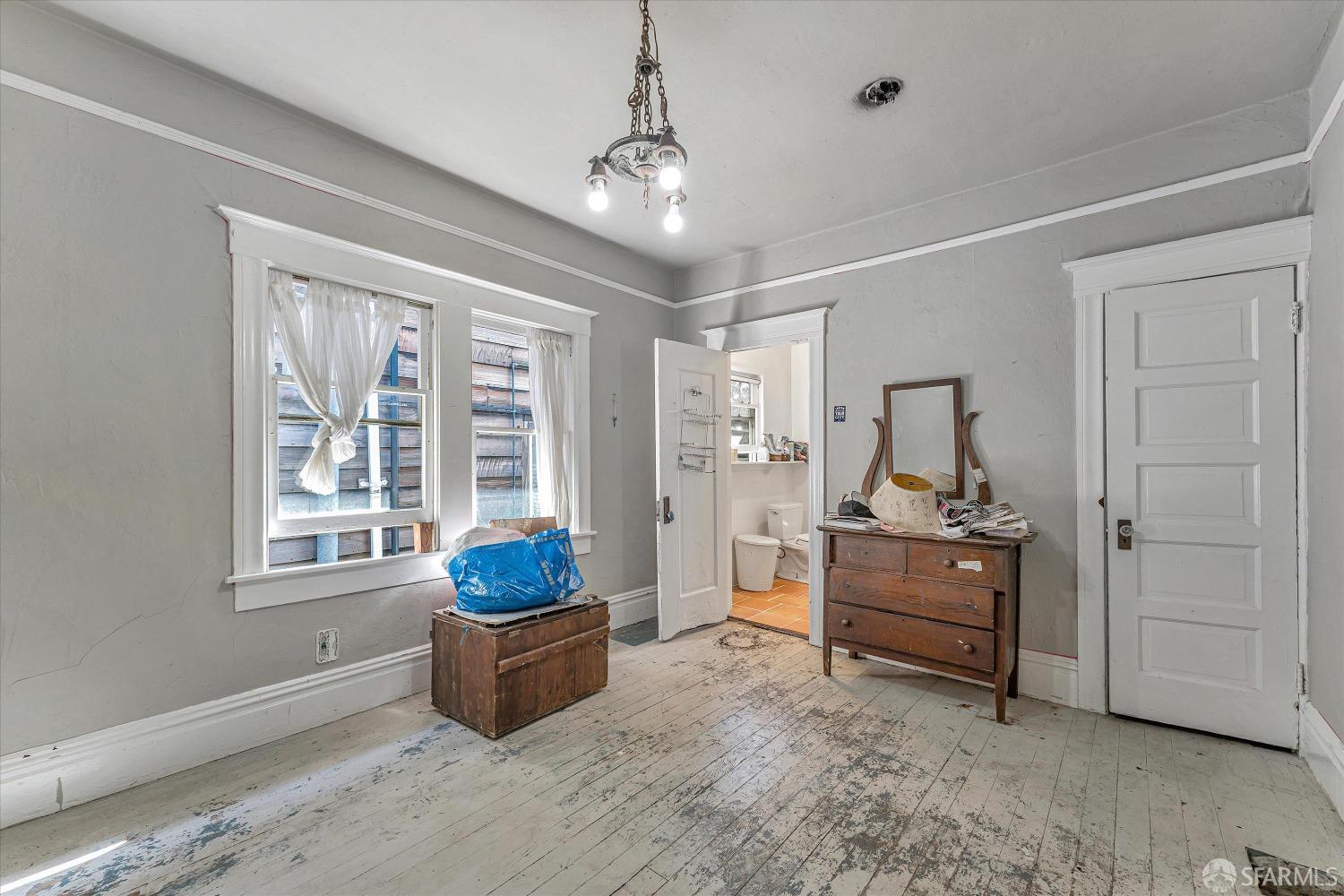 1917 Oregon Street Berkeley, CA 94703 - Photo 20 of 43 a living room with furniture and windows