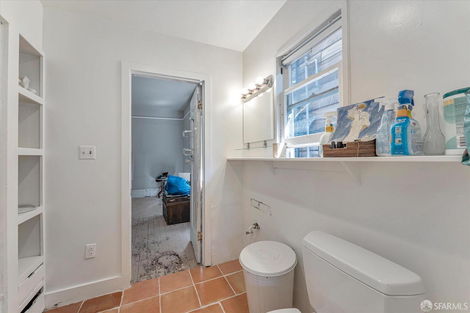 1917 Oregon Street Berkeley, CA 94703 - Photo 22 of 43 a bathroom with a sink toilet and shower
