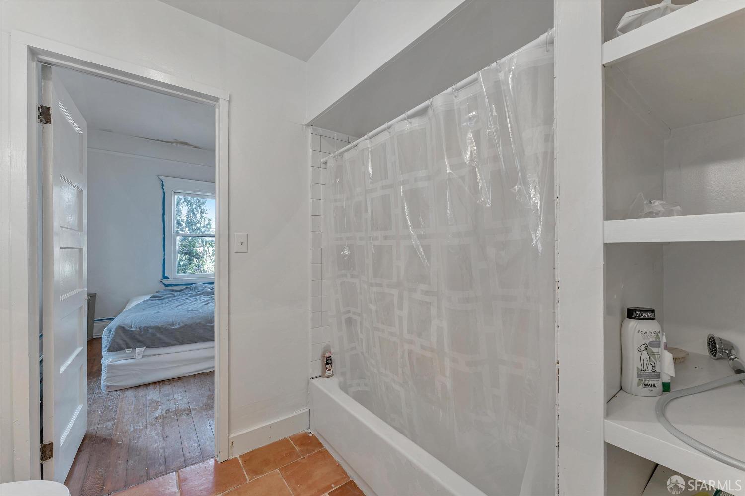 1917 Oregon Street Berkeley, CA 94703 - Photo 23 of 43 a bathroom with a sink and a shower