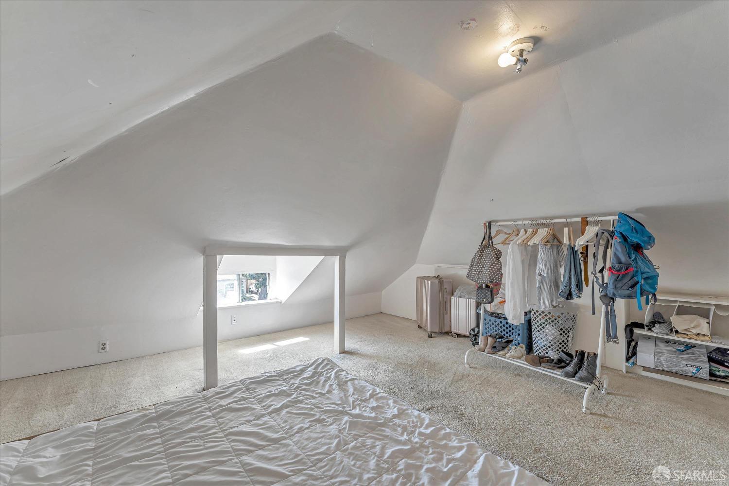 1917 Oregon Street Berkeley, CA 94703 - Photo 29 of 43 a view of a livingroom with walk in closet and bedroom