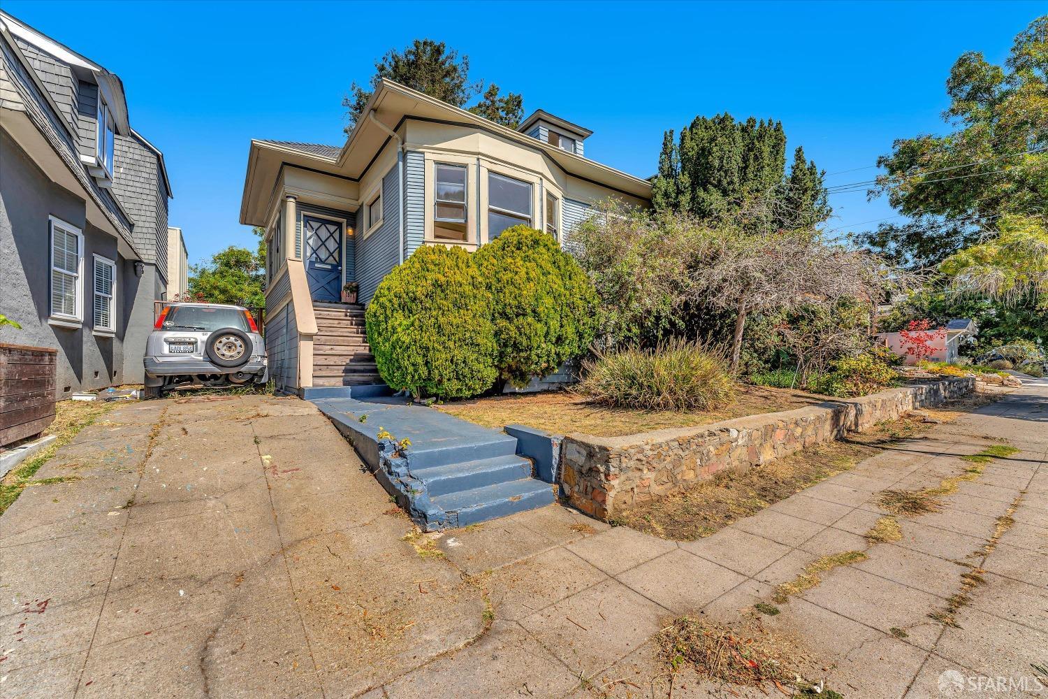 1917 Oregon Street Berkeley, CA 94703 - Photo 3 of 43 a front view of a house with a yard