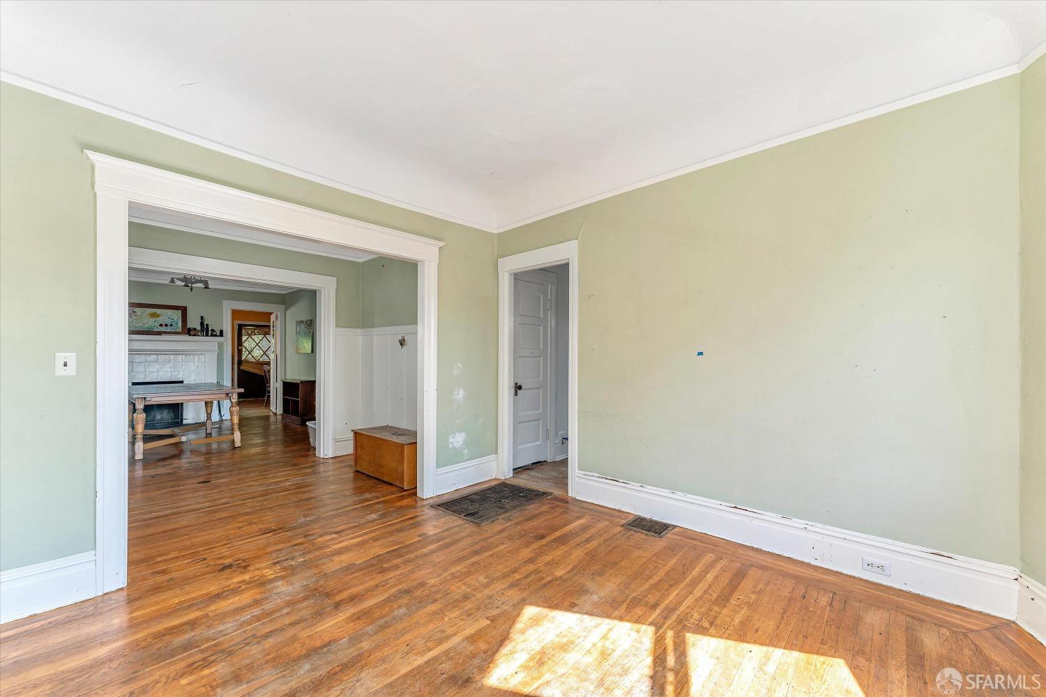1917 Oregon Street Berkeley, CA 94703 - Photo 10 of 43 a view of a livingroom with wooden floor and furniture