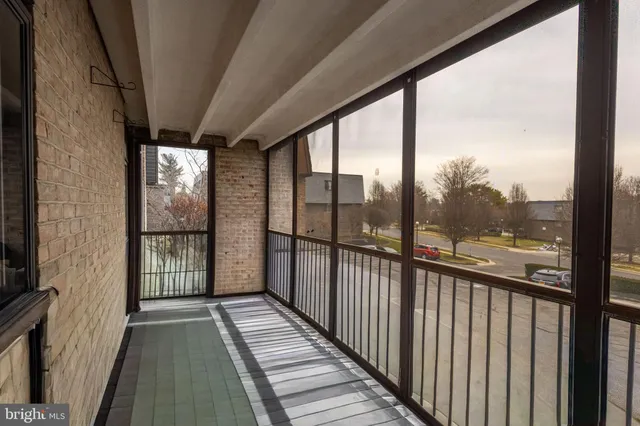 a view of a glass door with a balcony