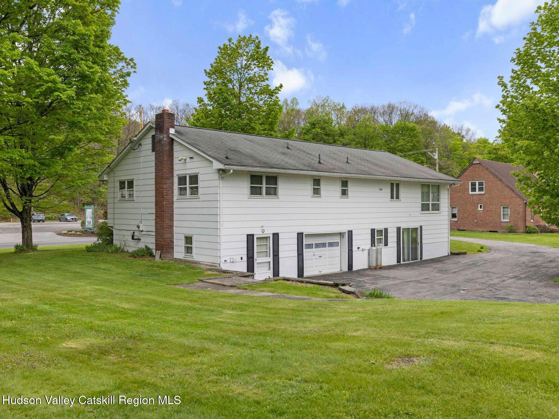 104 New Paltz Road Highland, NY 12528 - Photo 32 of 43 a view of a house with a backyard