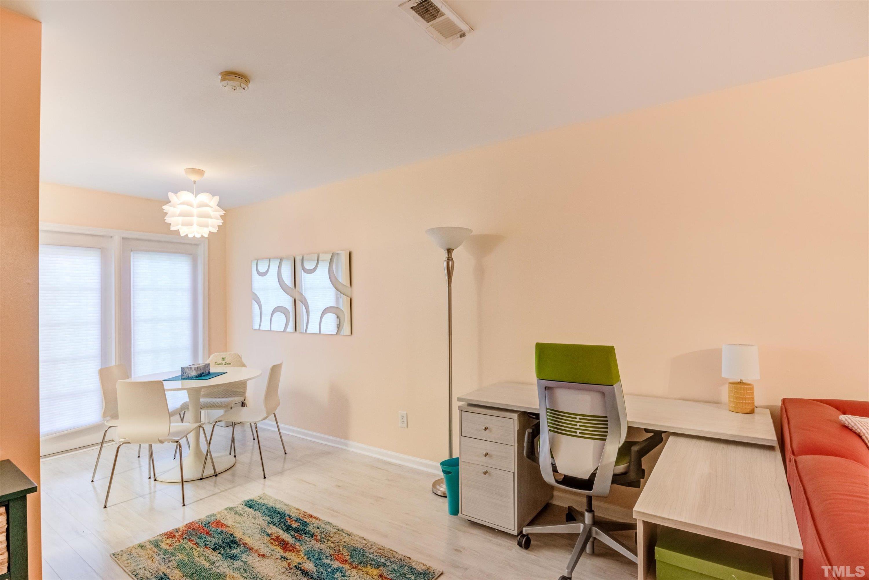7846 Averette Field Drive Raleigh, NC 27616 - Photo 11 of 21 a view of a workspace with furniture