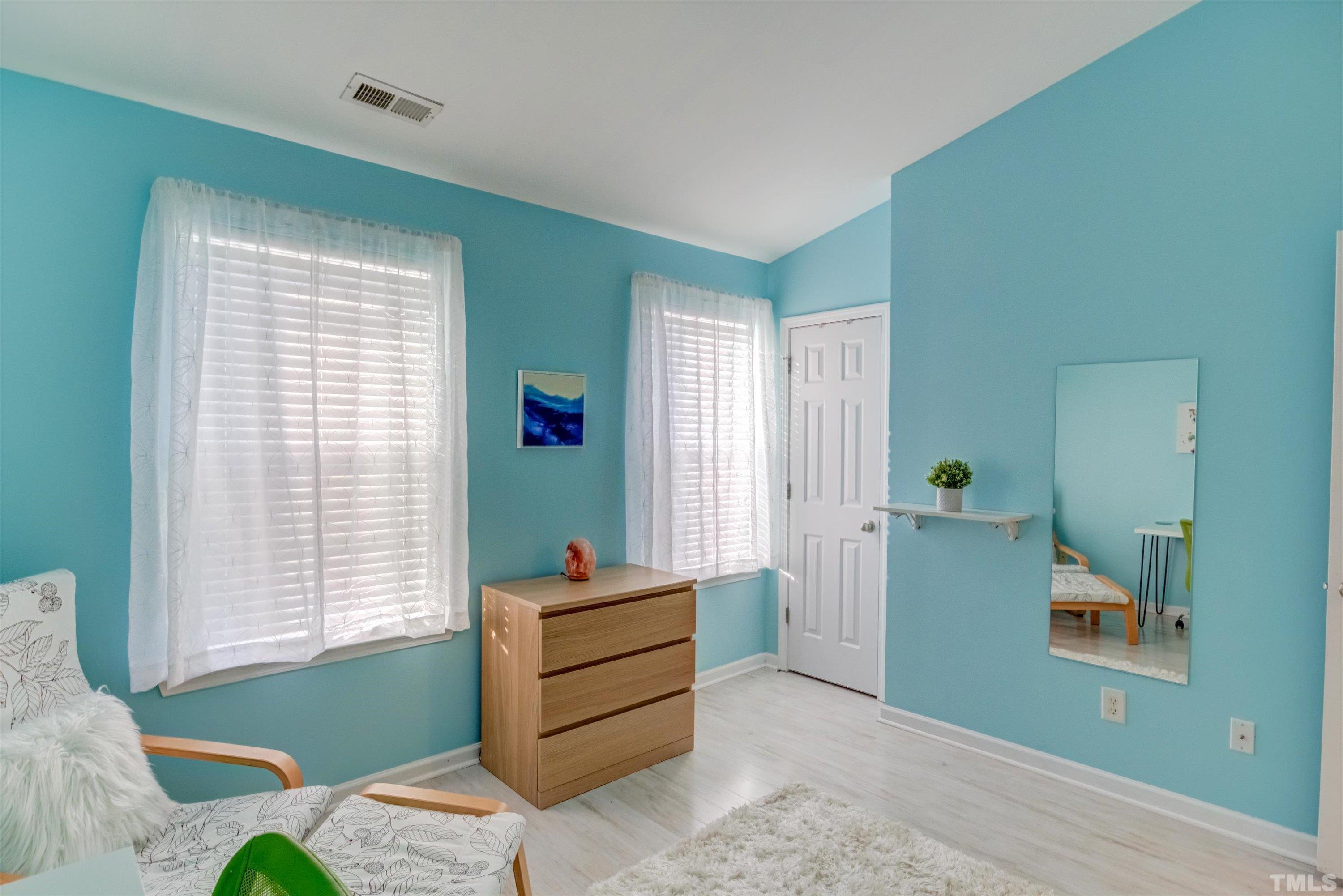 7846 Averette Field Drive Raleigh, NC 27616 - Photo 17 of 21 a room with furniture and window