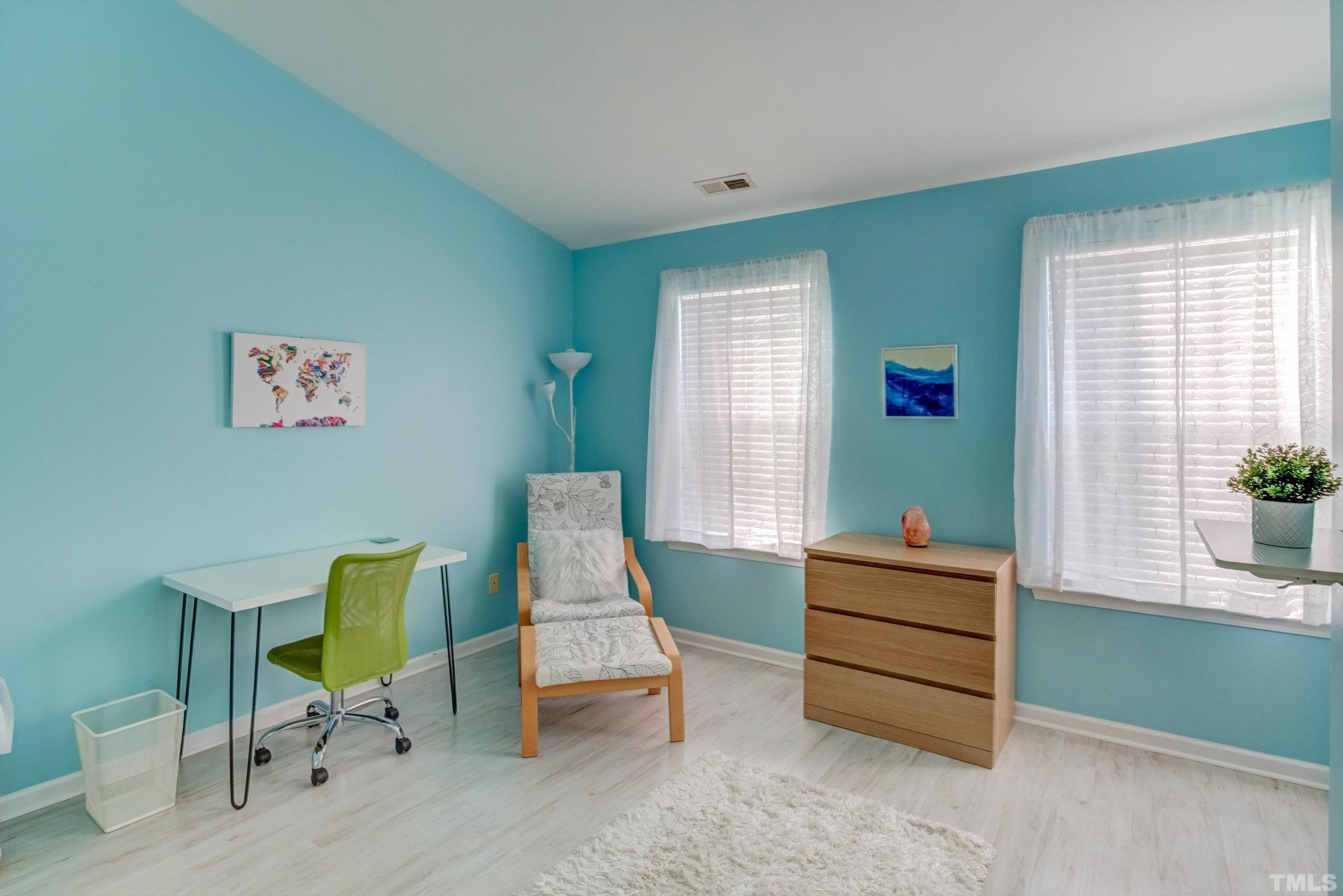 7846 Averette Field Drive Raleigh, NC 27616 - Photo 18 of 21 a living room with furniture and a window