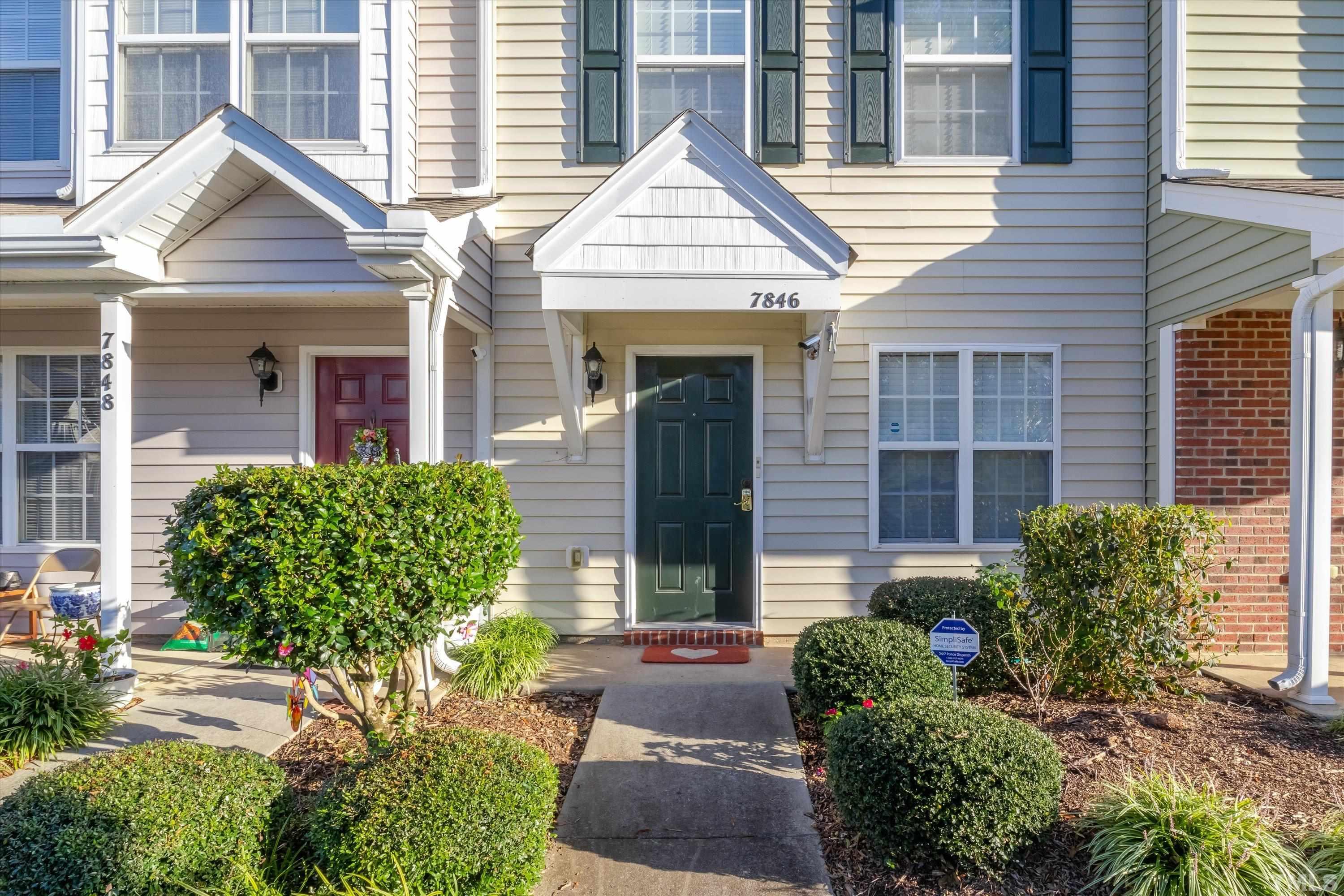 7846 Averette Field Drive Raleigh, NC 27616 - Photo 2 of 21 a front view of a house with garden