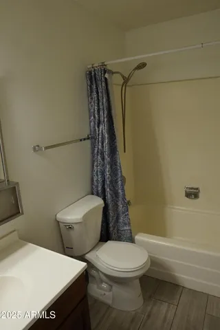 a view of livingroom with entryway and furniture